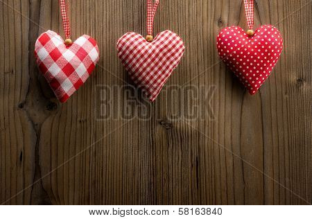 Valentine's Day wallpaper - Textile hearts hanging on the rope