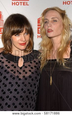 Milla Jovovich and Carmen Hawk  at the Los Angeles Debt of Jovovich-Hawk. Stoli Hotel, Hollywood, CA. 05-14-07