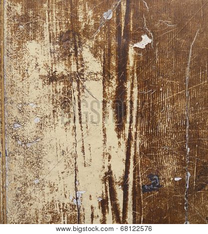 Close-up of old brown and white painted wood as background