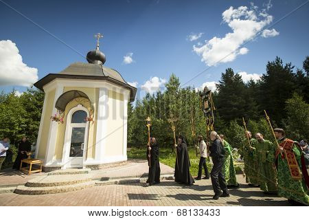 KRASNY BRONEVIK, RUSSIA - JULY 7, 2014: Celebrations commemorating the Rev. Anthony Dymsky (died 1224) in Antony Dymsky Monastery - Procession on Lake Dymsky, the great blessing of water and bathing.