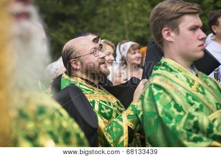 KRASNY BRONEVIK, RUSSIA - JULY 7, 2014: Celebrations commemorating the Rev. Anthony Dymsky (died 1224) in Antony Dymsky Monastery - Procession on Lake Dymsky, the great blessing of water and bathing.