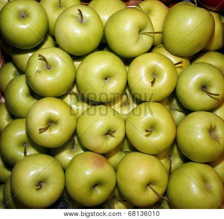 Green apples on market