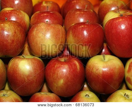 Group of red apples in row