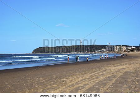Fishermen On Durban's Addington Beach With Bluff In Background