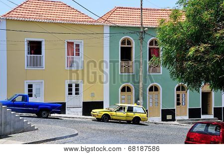Cars By Colorful Homes