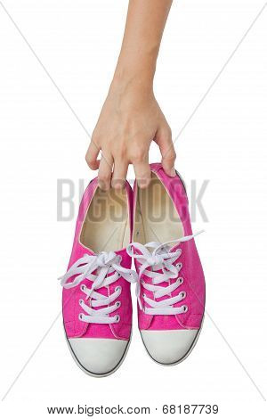 Bright Pink Canvas Shoes Handle On White Background.