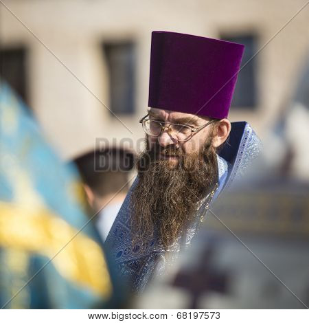 TIKHVIN, RUSSIA - JULY 9, 2014: Unidentified participants Orthodox divine Liturgy on the occasion celebrations of the 10th anniversary of the return of the Tikhvin icon of the Mother of God.