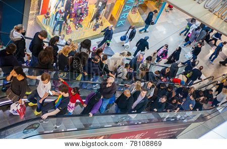 Westfield Stratford City Shopping centre with lots of people rushing for Christmas sale.