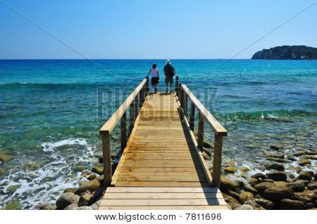 Couple Enjoying The Sea View