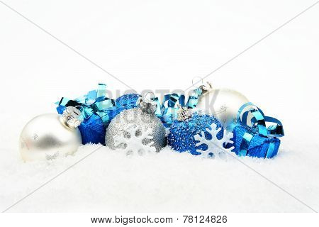 Blue, silver Christmas Decoration On Snow