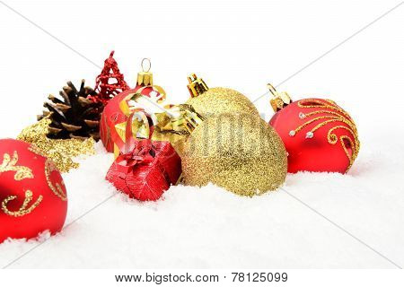 Golden,red Christmas Decoration On Snow