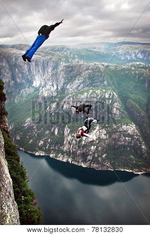 BASE jump off a cliff.