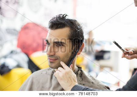 Young Man At Hairdresser