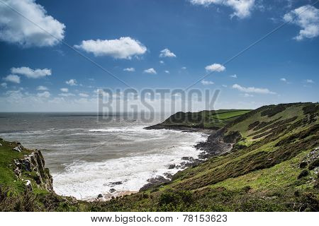 Summer Landscape Of Worm's Head And Rhosilli Bay In Wales