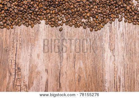 Coffee Beans On Wooden Background