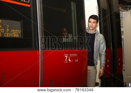 Young Man On Train, Standing In Open Door Treshold