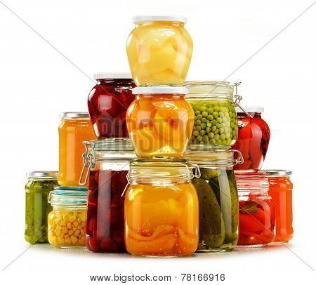 Jars With Pickled Vegetables, Fruity Compotes And Jams Isolated