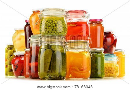 Jars With Pickled Vegetables, Fruity Compotes And Jams Isolated