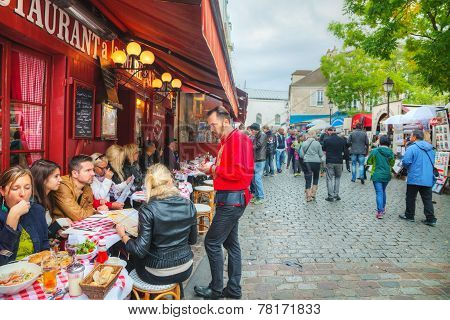 Crowded Street On The Montmartre Hill In Paris