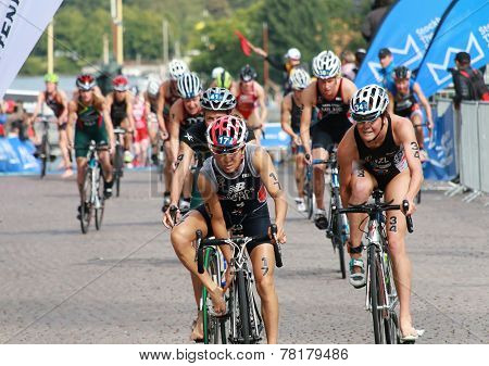 Barabara Riveros And Simone Ackermann Cycling In The Triathlon Event