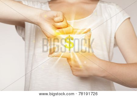 Hands creating a form with shining dollar sign in the center 