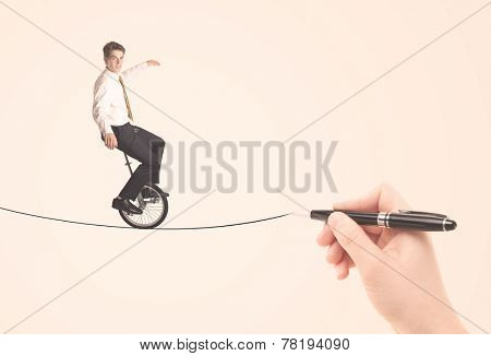 Businessman riding monocycle on a rope drawn by hand concept