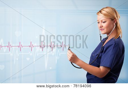 Pretty young medical doktor listening to red pulse and heart rates