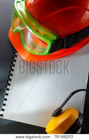 Goggles, Earphones And Red Helmet