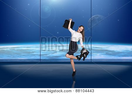 Dancing businesswoman