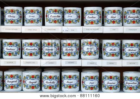 ST. GILGEN, AUSTRIA - DECEMBER 14: Mugs with names sold in souvenir shop in St. Gilgen on Wolfgang See lake, Austria on December 14, 2014.