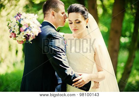 Close Up Portrait Of Wedding Couple