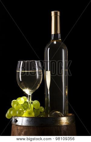 White wine on wooden background