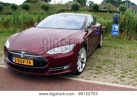 Tesla Model S being charged