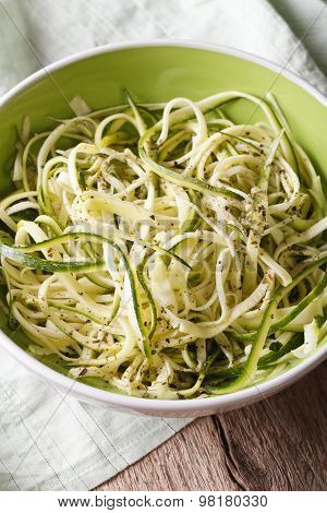 Natural Food: Raw Zucchini Pasta In A Bowl Closeup. Vertical