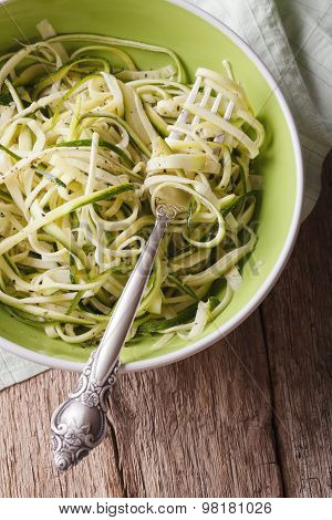 Dietary Zucchini Pasta In A Bowl Closeup. Vertical Top View
