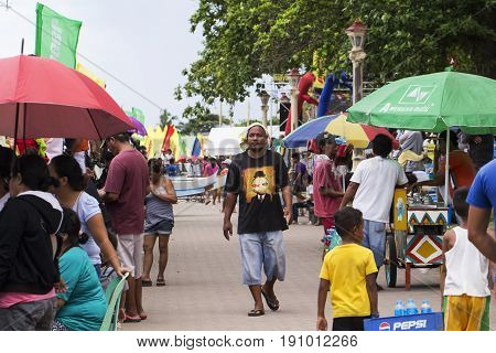 Dumaguete Philippines - 13 May 2017: city street view with local people. Philippines people. Tropical country lifestyle. Tropical travel destination. Exotic place of living. Summer vacation travel