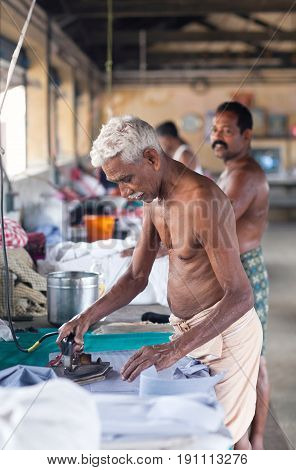 Indian People Working Hard On Dhobi Ghat In Fort Cochin, India