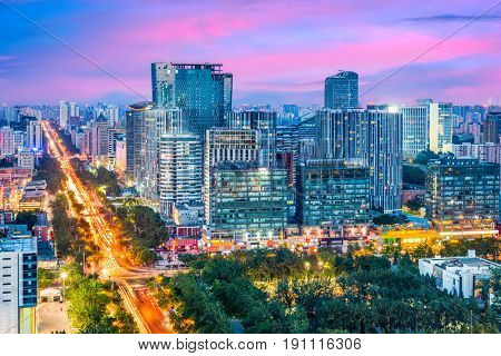 Beijing, China modern financial district skyline at dusk.