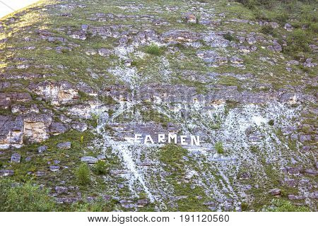 Wonderful landscape with rocks and mountains at orheiul vechi memorial in moldova, near raut river, carmen letters on top of hill, eco butuceni village