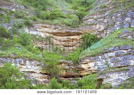 Wonderful landscape with rocks and mountains at orheiul vechi memorial in moldova, near raut river, blue sky, sunny day, eco butuceni village