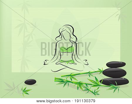 Green frame with spa stones and meditating woman