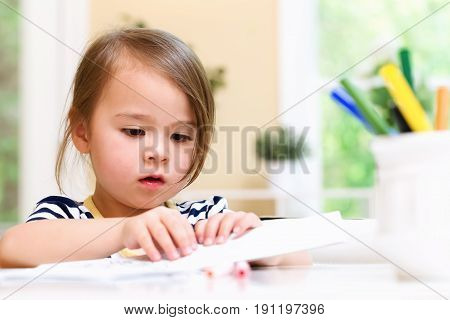 Toddler Girl Drawing And Doing Crafts