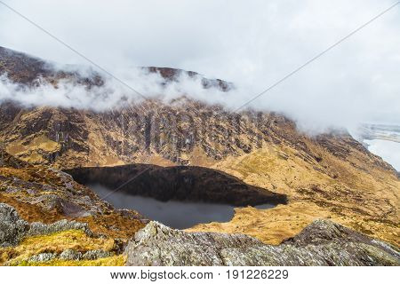 A Beautiful Irish Mountain Landscape With A Lake In Spring. Gleninchaquin Park In Ireland.