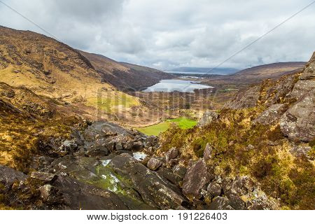 A Beautiful Irish Mountain Landscape With A Lake In Spring. Gleninchaquin Park In Ireland.