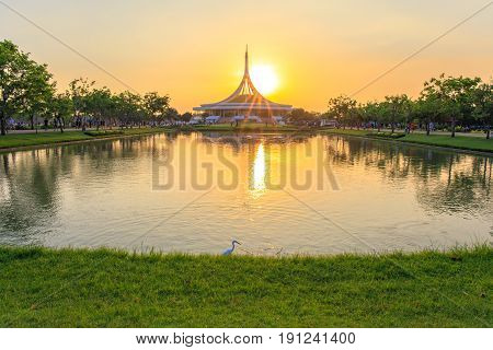 Bangkok, Thailand. - April 23, 2017 : Sunlight, Sunrays or sunbeam star over the roof of Ratchamangkhala Pavilion at public park name Suan Luang Rama IX on sunset time Bangkok, Thailand.