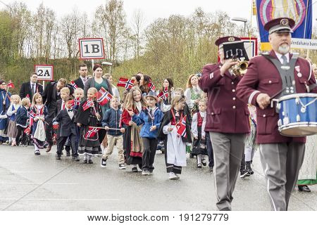 VERDAL NORWAY - MAY 17 2017: National day in Norway. Norwegians at traditional celebration and parade on may 17 2017 in Verdal. People on parde before school in Verdal. Constitution Day is the National Day of Norway.