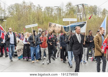 VERDAL NORWAY - MAY 17 2017: National day in Norway. Norwegians at traditional celebration and parade on may 17 2017 in Verdal. People on parde before school in Verdal. Constitution Day is the National Day of Norway.