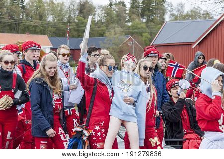 VERDAL NORWAY - MAY 17 2017: National day in Norway. Norwegians at traditional celebration and parade on may 17 2017 in Verdal. People on parde before school in Verdal. Constitution Day is the National Day of Norway.