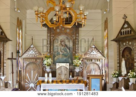 OJCOW POLAND - 25 AUGUST: Interior of chapel on water on august 25 2012 in Ojcow. This is old wooden chapel on pillar in mountain brook.