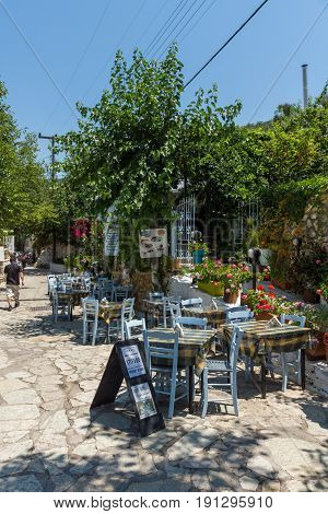 AGIOS NIKITAS, LEFKADA, GREECE JULY 16, 2014: Traditional houses in village of Agios Nikitas, Lefkada, Ionian Islands, Greece